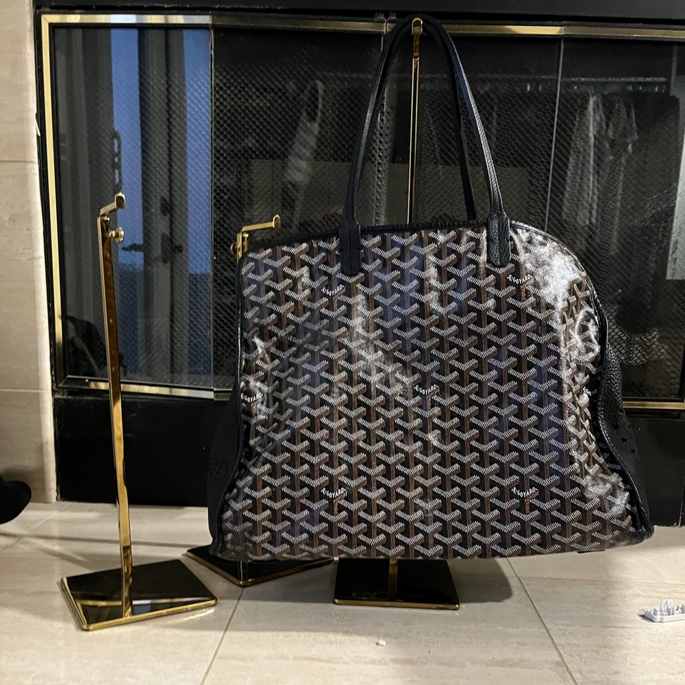 3 gold colored purse holders